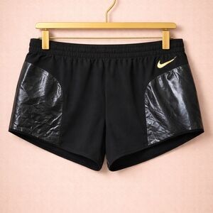 Nike Women's Black and Gold Athletic Shorts